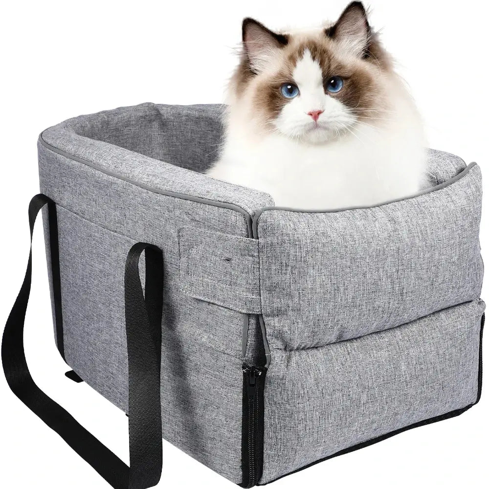 The armrest pet car booster seat containing a cat.