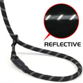 The reflective traction dog leash, displaying its reflective design.